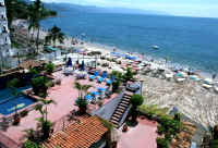 views of El Dorado pool and sun deck terrace and los muertos beach and Banderas Bay