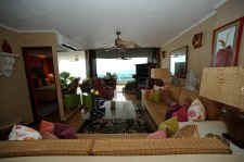 looking into living room and onto terrace balcony with los Muertos beach view