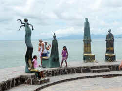 Rotunda of the Sea statues by Colunga