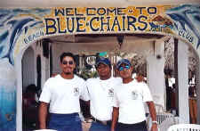gay beach and blue chairs staff