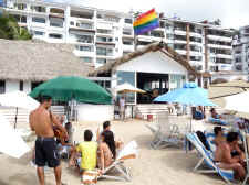 gay flag over the beach club El Lido restaurant