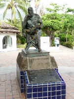 statue of famed director John Huston on the Cuale river island