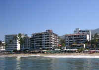 El Dorado beachfront condo building on the right, La Palapa condos third from left. puerto vallarta