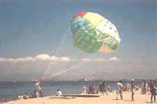 Paracaidas - photo by William Clark parasailing on los muertos beach