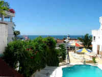 partial view of Banderas Bay, pool and sun deck terrace