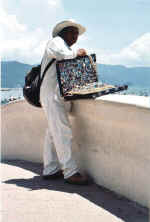 local puerto vallarta beach vendor and his silver